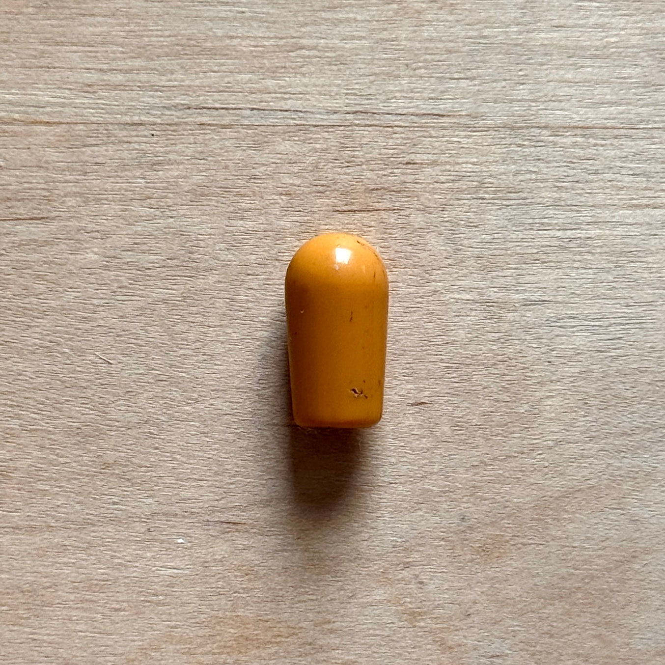 Vintage Kippschalterkappe in Bernstein