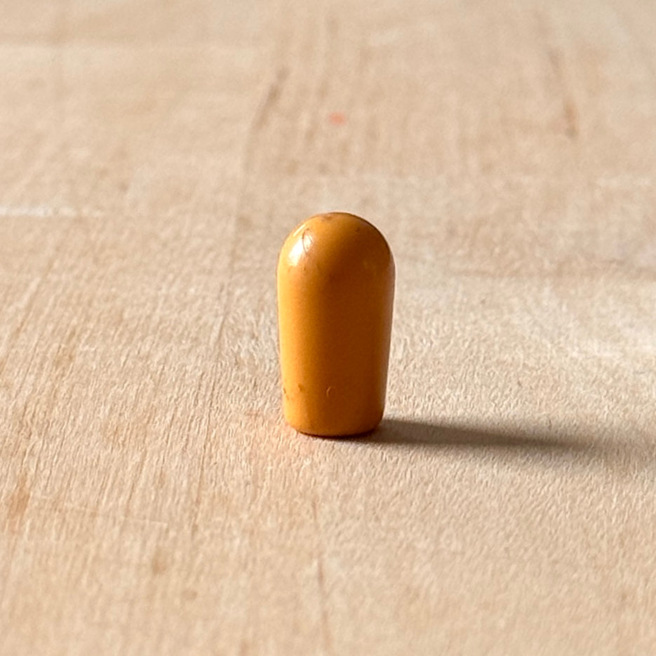 Vintage Kippschalterkappe in Bernstein